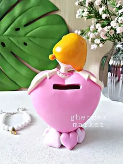قلک و مجسمه دختر قلبی