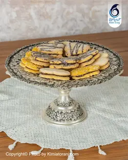شیرینی خوری شبه نقره تک پایه قلمزنی طرح صورت آبکاری پتینه - مجموعه صنایع دستی کیمیا ترنج