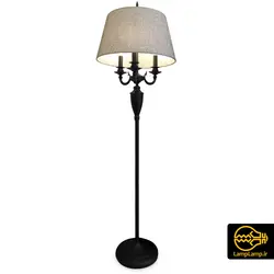 آباژور ایستاده کنار مبلی سه شعله