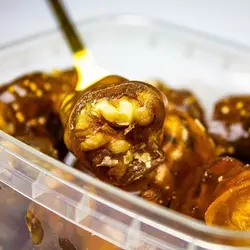 خرید سجوک گردویی لقمه ای چند طعم شهدمزدکان - 400 گرم