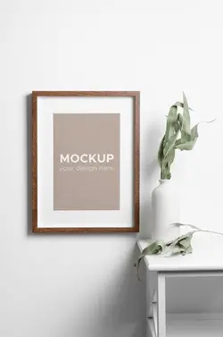 موکاپ موکاپ قاب عکس چوبی منظره روی دیوار سفید با اکالیپتوس خشک