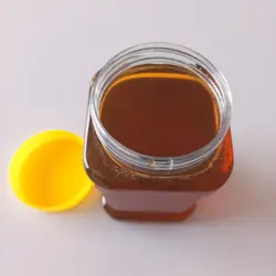 عسل یک کیلویی موم دار