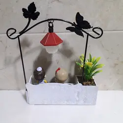 مجسمه چراغ دار دختر و پسر عاشق روی نیمکت