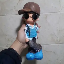 مجسمه پسر عینکی (قلک دار)