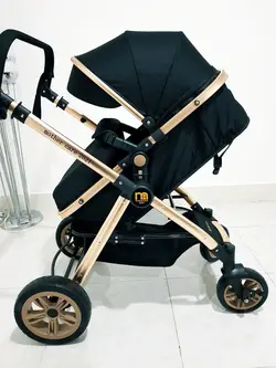کالسکه دسته دو طرفه و سید متحرک مادرکر Mothercare - فروشگاه سیسمونی روژان