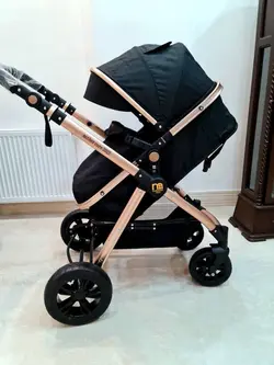 کالسکه دسته دو طرفه و سید متحرک مادرکر Mothercare - فروشگاه سیسمونی روژان
