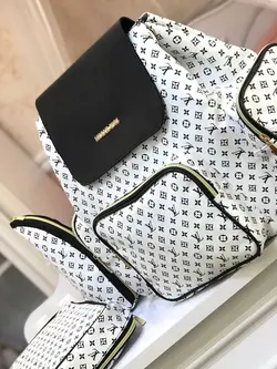 ساک لوازم چرم نوزادی 4کاره یوناکو مایکل کورس مدل :(اورانوس ) UNACO - فروشگاه سیسمونی روژان