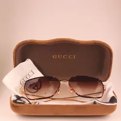 عینک آفتابی گوچی GUCCI - فروشگاه زند