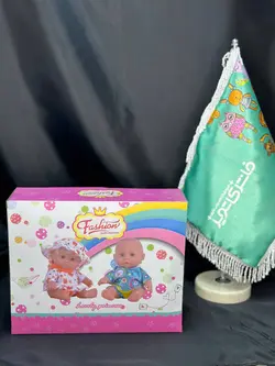 عروسک نوزاد بیبی بورن با وسایل