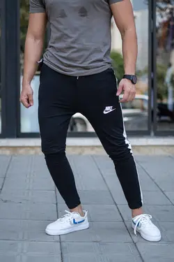 شلوارnike اسلش خط سفید کد 1024 - پوشاک سجاد کمرون