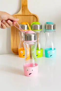 قمقمه طرح لبخند بنددار صورتی