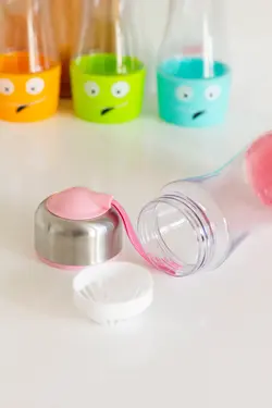 قمقمه طرح لبخند بنددار صورتی