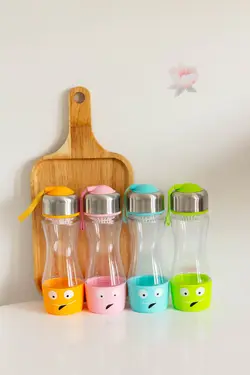 قمقمه طرح لبخند بنددار صورتی