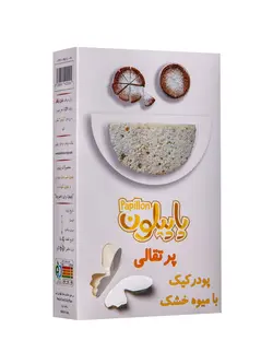 پودر کیک پرتقالی با میوه خشک به همراه کاغذ روغنی