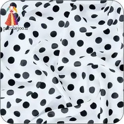 پارچه کرپ نخ توپی سفید-مشکی