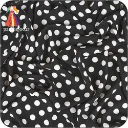 پارچه کرپ نخ توپی مشکی-سفید