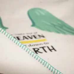 زیرانداز تعویض نوزاد طرح بال فرشته