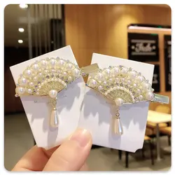 گیره مو مدل پر طاووس - فروشگاه اینترنتی هیس