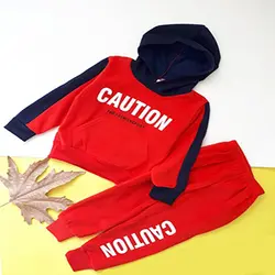 ست هودی شلوار مخمل پسرانه جیب دار طرح CAUTION کد 1711