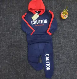 ست هودی شلوار مخمل پسرانه جیب دار طرح CAUTION کد 1711