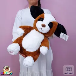 عروسک سگ نشسته بامزه