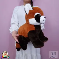 عروسک راکون مدال دار