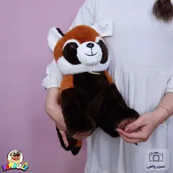 عروسک راکون مدال دار