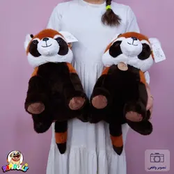 عروسک راکون مدال دار