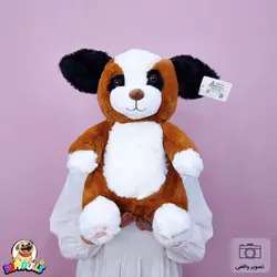 عروسک سگ نشسته بامزه