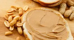 حلوا - کره بادام زمینی عقاب - 330 گرم