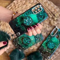 قاب موبایل آیفون ماربل پام پام یشمی نگین دار + پام پام + پاپ سوکت (سبز)