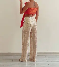 شلوار پولکی طلایی طرح دار