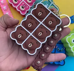 کیف سیلیکونی پاپ ایت همراه آویز جاکلیدی