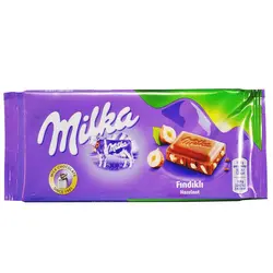 شکلات شیری با تکه های فندق ۱۰۰ گرم میلکا - milka