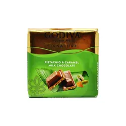 شکلات شیری با تکه های پسته و کارامل ۶۰ گرم گودیوا - godiva