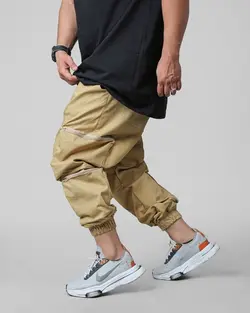 شلوار اسلش جیب زیپی کرمی