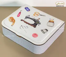 جعبه و وسایل خیاطی طرح چرخ خیاطی و لوازم سفید - صفاهوم