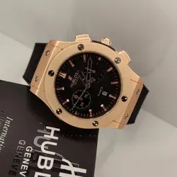 ساعت هابلوت HUBLOT تقویم دار رنگ مشکی دور طلایی کد 1029 به همراه جعبه شکیل
