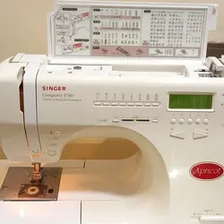 چرخ خیاطی گلدوزی سینگر ژاپن 100مدل دوخت ژاپن اصل اکروپاتApricot 9780 با نمایشگر مدل ژتون با قاب و سنگین