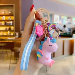 آویز کلید طرح تکشاخ مدل صدفدار