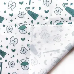 پارچه روپوش دندانپزشکی طرح دندان و خمیردندان