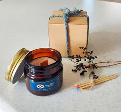 شمع  شیشه قهوه ای با رایحه وانیل