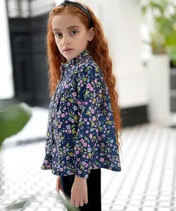 شومیز مخمل کبریتی سرمه‌ای گلدار
