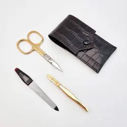 ست ابرو و ناخن طلایی چرم طرحدار نیپس