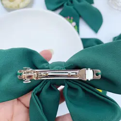 گیره فرانسوی گلدوزی کرپ سبز