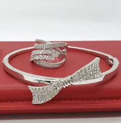 ست دستبند و انگشتر نگین دار نقره ای پاپیون