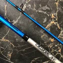 چوب ماهیگیری شیمانو فول کربن دو تکه اکشن ۶۰-۹۰ گرم ۲۱۰ سانتی متر SHIMANO CRUZAR AX