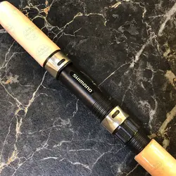 چوب ماهیگیری شیمانو فول کربن دو تکه اکشن ۶۰-۹۰ گرم ۲۱۰ سانتی متر SHIMANO CRUZAR AX