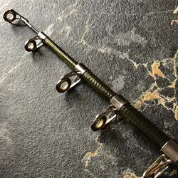 چوب ماهیگیری مسافرتی فول کربن Yong Yi طول ۱۸۰ سانتی متر