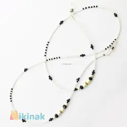 بند عینک شامل منجوق سفید و مشکی